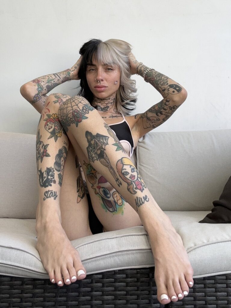 Cruella Morgan onlyfans model twitter leaks picture sitting on the couch