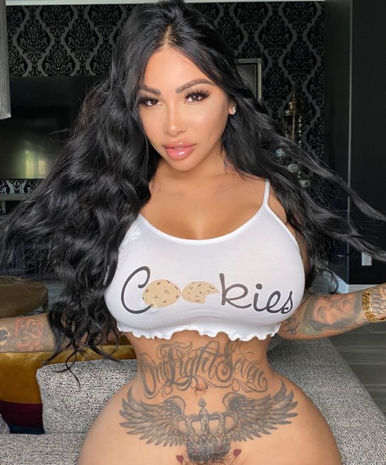 Brittanya Razavi onlyfans model picture wearing a sexy white top