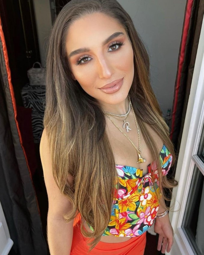 Abella Danger onlyfans model picture wearing colorful top