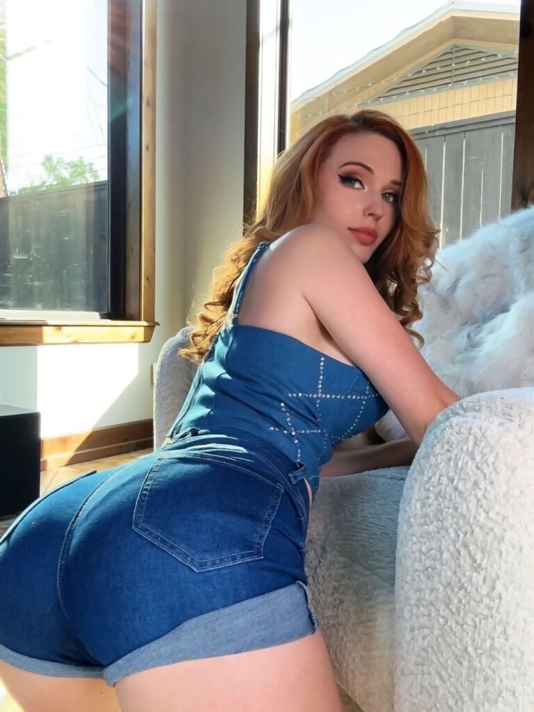 Amouranth (@Amouranth) Fansly model picture sitting wearing denim clothes