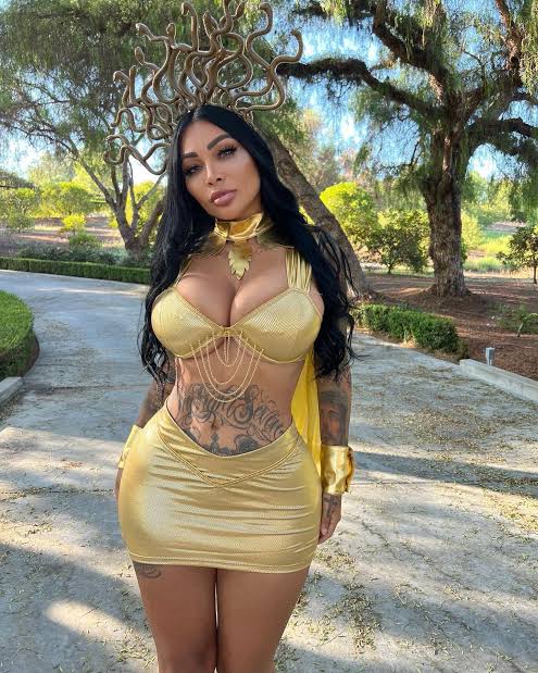 @brittanya2horny onlyfans model wearing sexy yellow dress