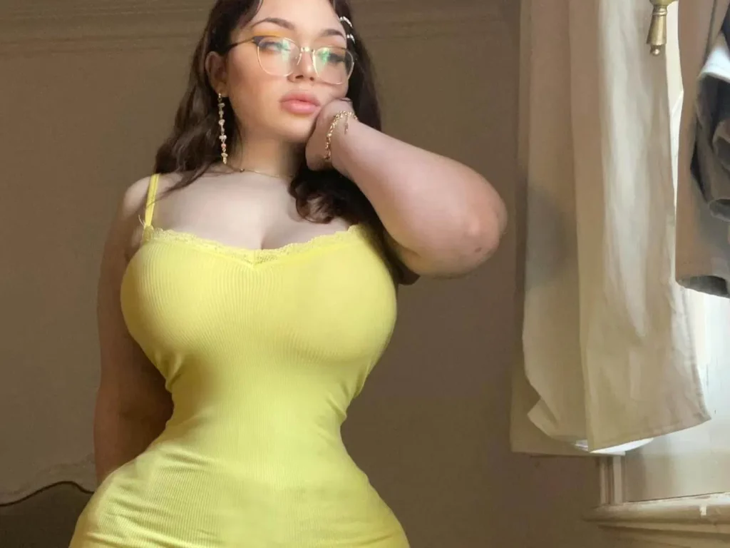 @candyrobbs onlyfans model wearing yellow dress