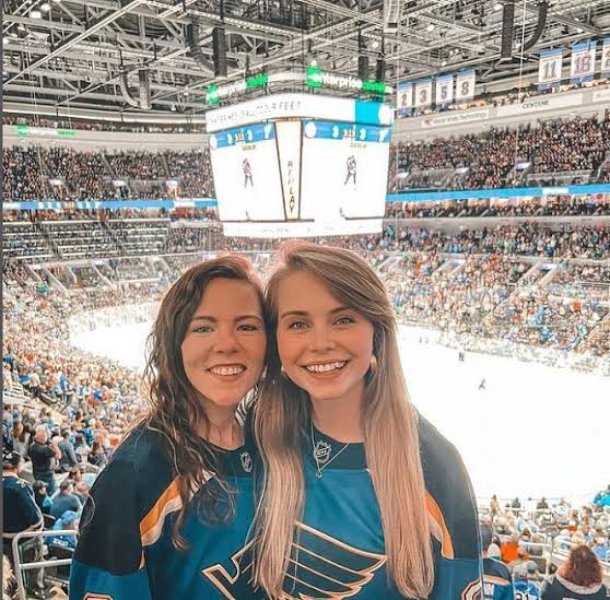 @haileeandkendra onlyfans model couple is taking a picture in a stadium