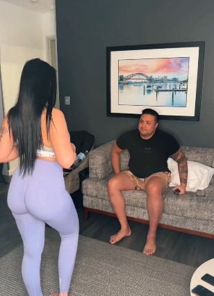 @katandromeo onlyfans model man sitting and girl standing