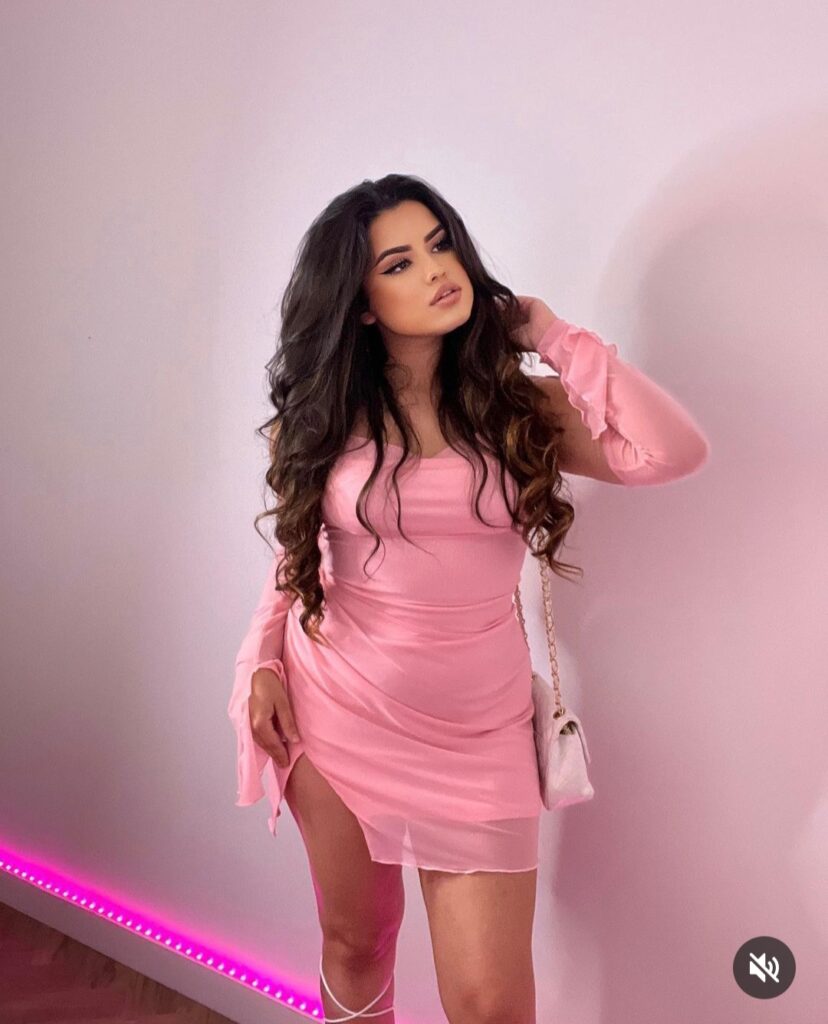 @laila.gomez onlyfans model wearing pink dress