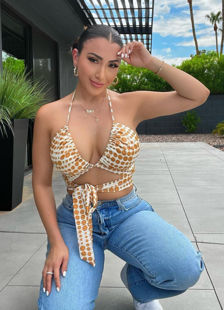 Alex Bravo @alexox0 sexy photo outside wearing a necklace