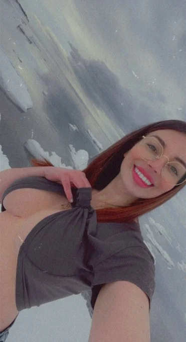Myla Del Rey onlyfans model selfie in snow showing her boobs