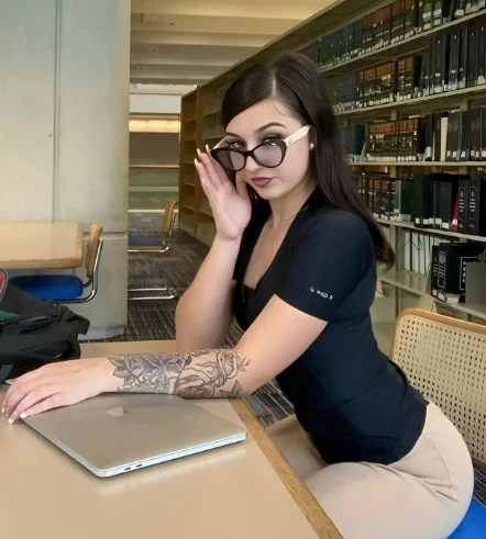 grace (@bbyyygrace) onlyfans model picture wearing glasses and black top