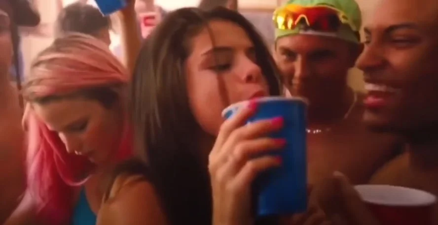 Selena Gomez movie scene in Spring Breakers picture holding a cup