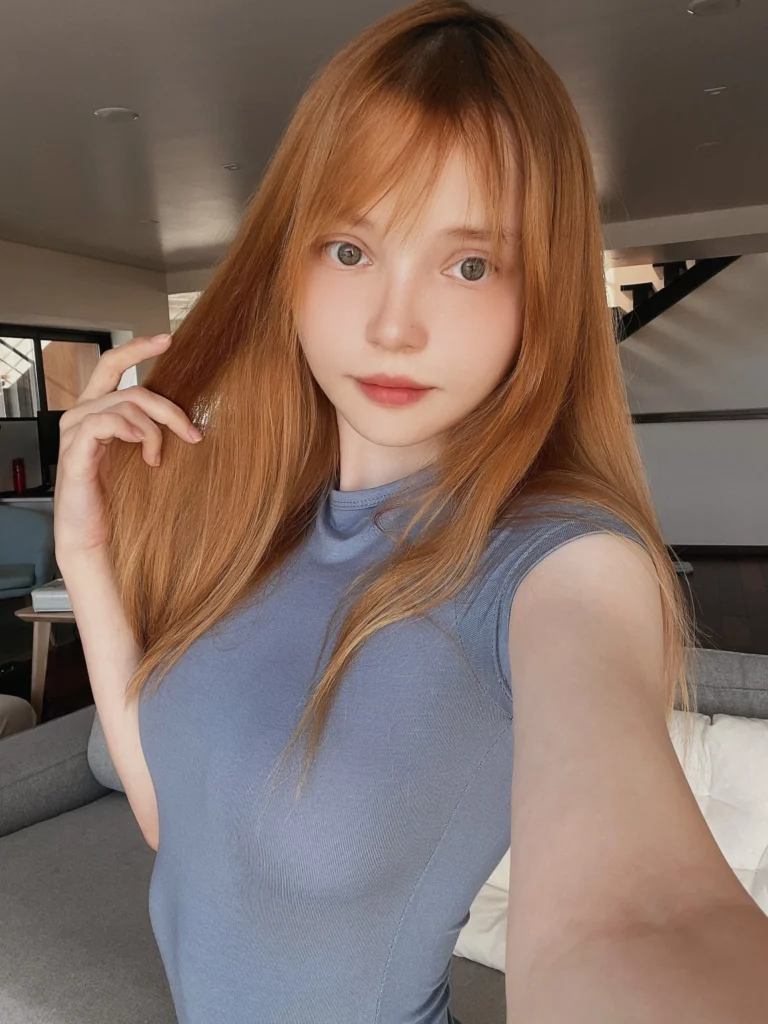 Alisa Pika Pika (@AlisaPikaPika) Fansly model selfie wearing blue top