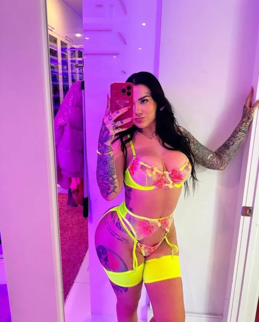 Karmen Karma onlyfans model picture wearing sexy yellow lingerie