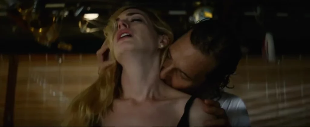 Anne Hathaway leaks in the movie Serenity. She is with a man kissing her in neck