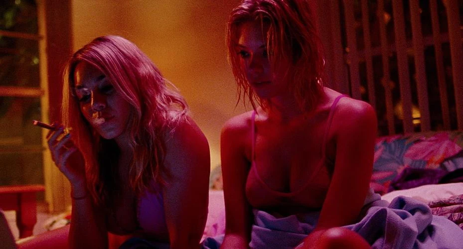 Ashley Benson leaks in the movie Spring Breakers. She sitting in bed with another woman. They both wearing bra