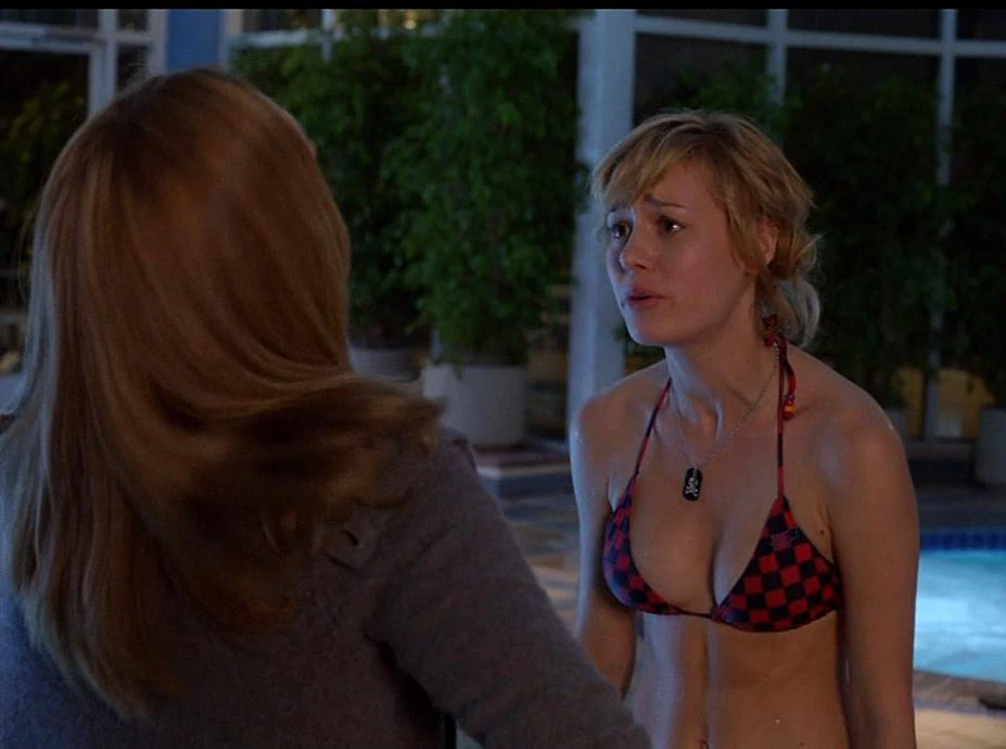 Brie Larson leaks in the movie United States of Tara. She is taking to a woman wearing black bra