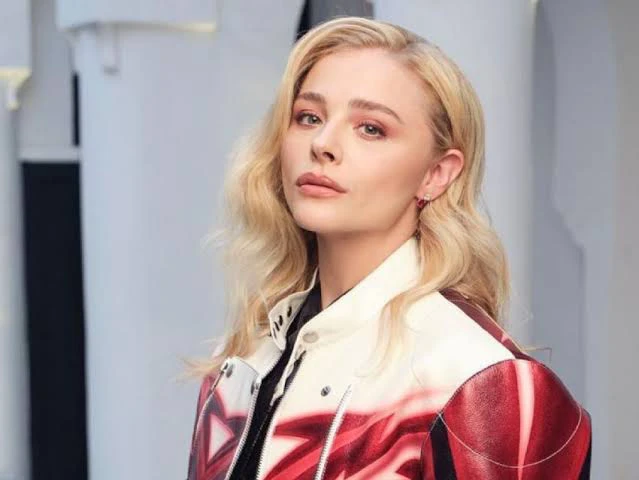 Chloe Grace Moretz picture wearing a white and red jacket