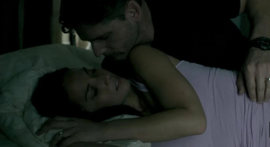 Olivia Munn leaks in the movie Deliver Us from Evil. She is lying down to bed with a man above her hugging her. She is wearing white top and a man wearing black shirt