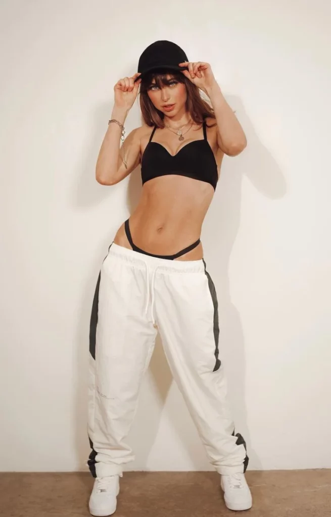 Riley Reid @rileyreidx3 OnlyFans Model sexy photo wearing a cap