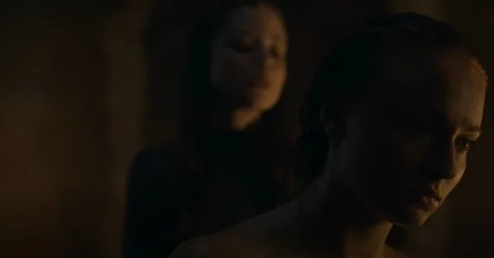 Sophie Turner leaks in the movie Game of Thrones. She is taking a bath with a woman behind her