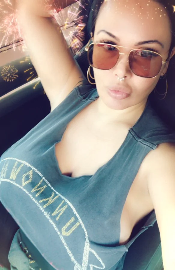 Sienna West (@siennawestland) OnlyFans model selfie in car wearing shades