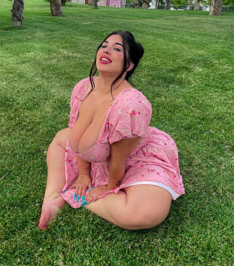 Natalia Lozano: @natalialozano OnlyFans Model sexy photo sitting in a grass