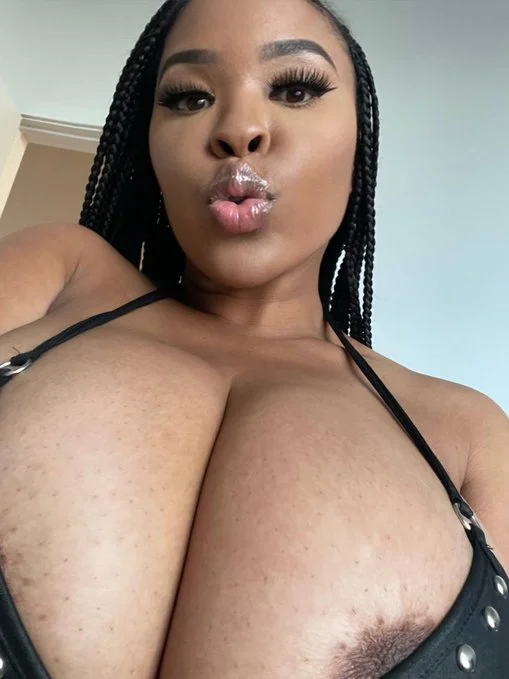 Aryana Adin (@aryana) OnlyFans model selfie showing her cleavage