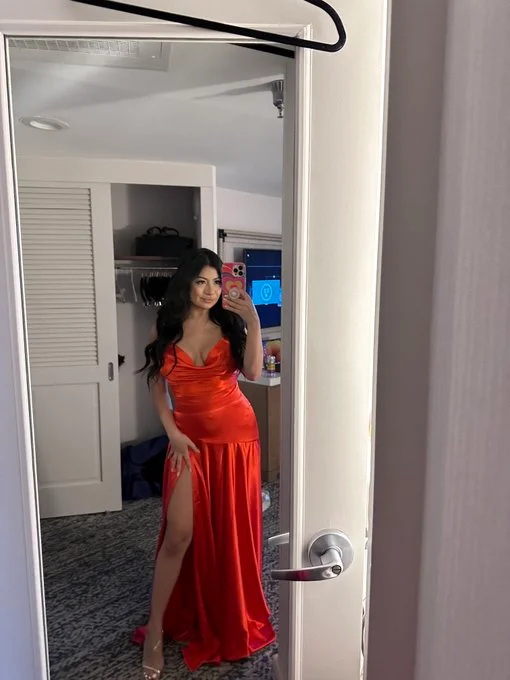 Cami Strella (@camistrella) OnlyFans model picture wearing red dress