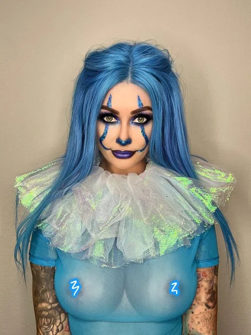 Laura Lux (@lauralux) OnlyFans model picture in her cosplay costume wearing a blue wig