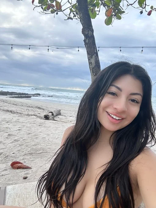 Cami Strella (@camistrella) OnlyFans model selfie in beach