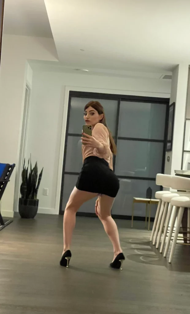 Natalie Mars (@nataliemars) OnlyFans model picture in office attire wearing black skirt