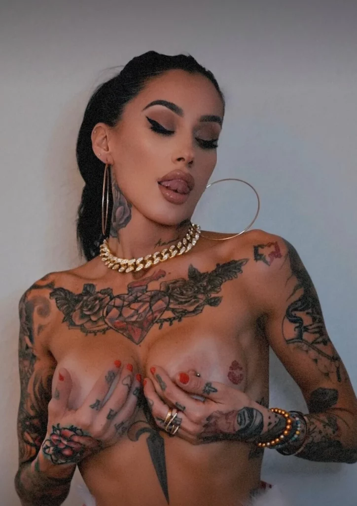 Alby Rydes (@albythegoat) OnlyFans model picture covering her boobs