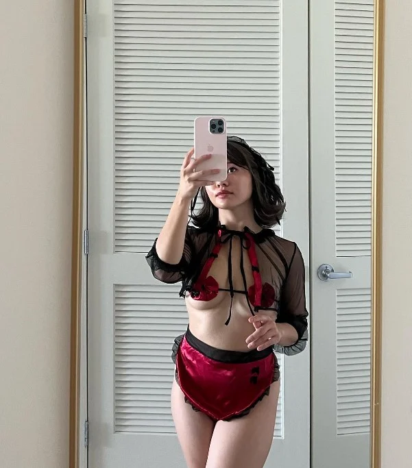 Jasmine Grey (@jasminegrey) OnlyFans model picture wearing red skirt