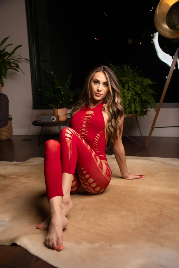 Mackenzie Mace (@mackenziemacexxx) OnlyFans model sexy picture wearing red clothes