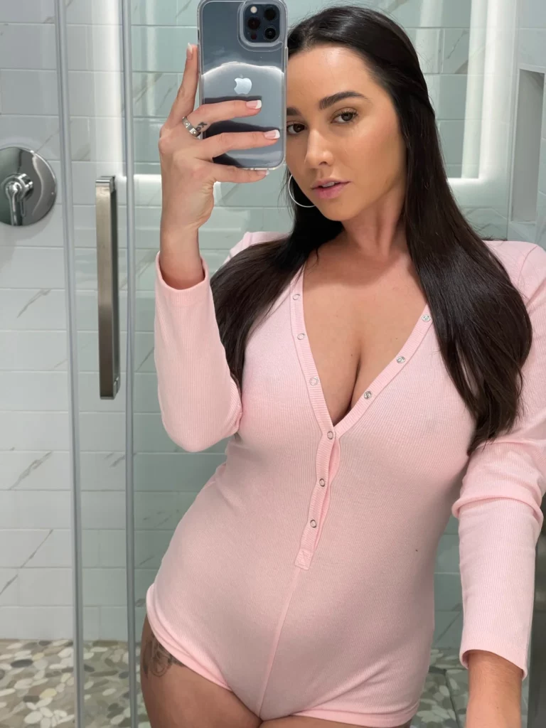 Karlee Grey (@karleegrey) OnlyFans model sexy picture wearing pink one piece