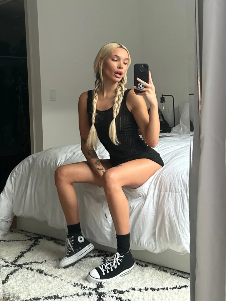 Rara Knupps (@raraknupps) OnlyFans model picture in bedroom wearing black dress