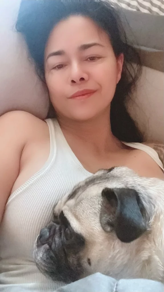 Dana Vespoli (@thedanavespoli) OnlyFans model picture with dog. shes wearing white top