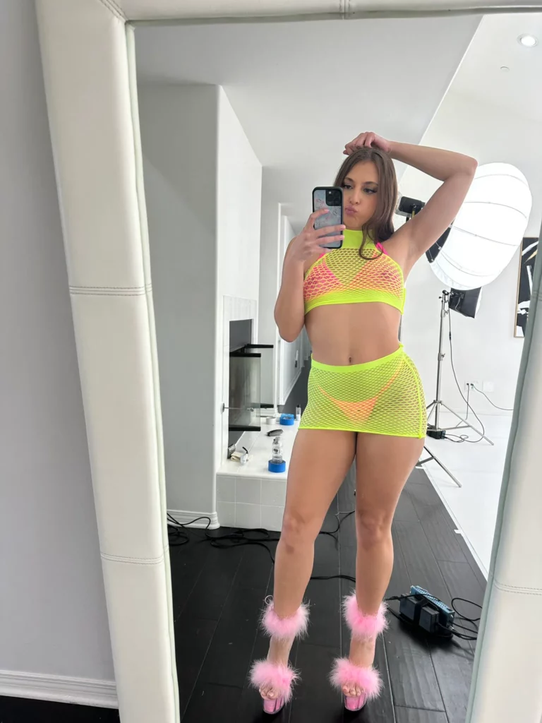 Gia Derza (@giaderza) OnlyFans model picture wearing yellow see-through top and skirt