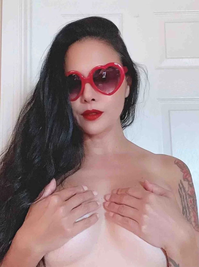 Dana Vespoli (@thedanavespoli) OnlyFans model picture covering her boobs with her hands